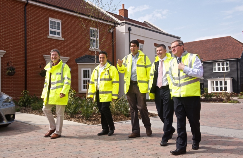 Ranil Jayawardena MP (centre), visiting new Brownfield Housing in Odiham