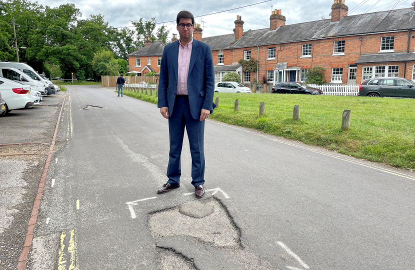 Ranil Jayawardena MP with pothole