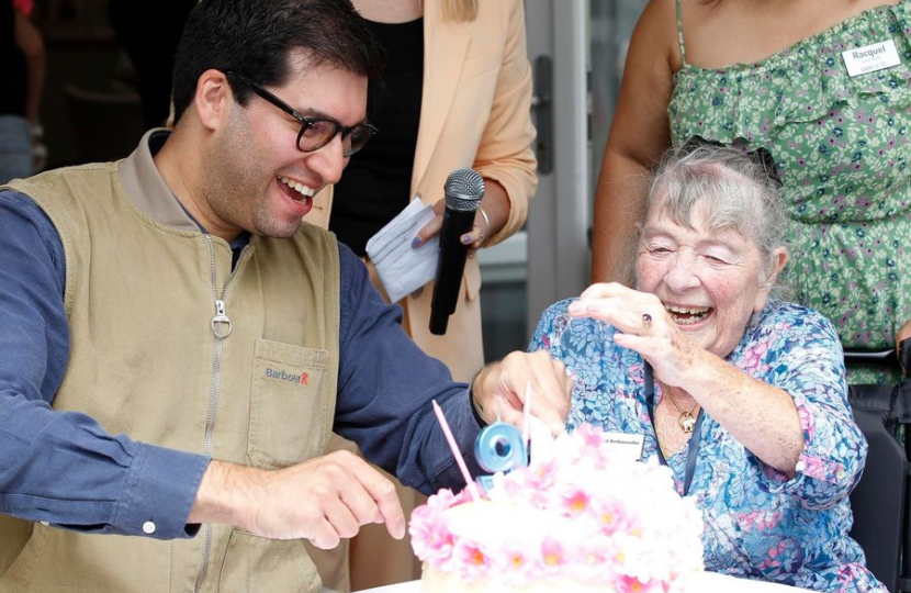 Ranil with a care home resident