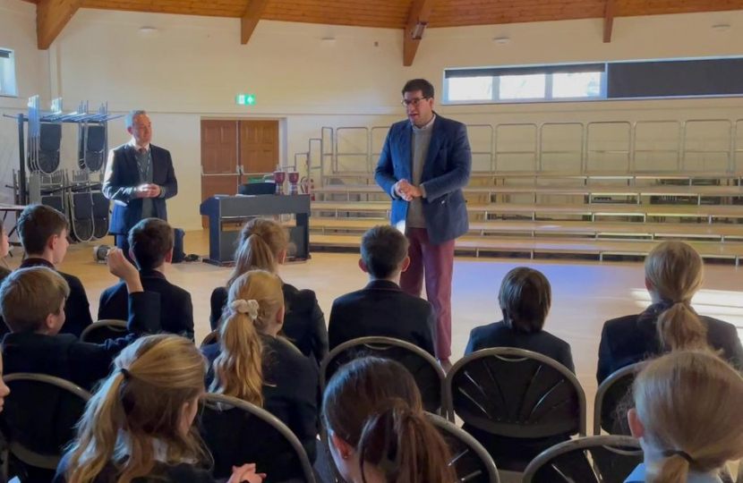 Ranil answering questions from students in the hall