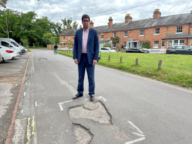 Ranil Jayawardena MP with pothole