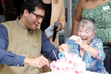 Ranil with a care home resident